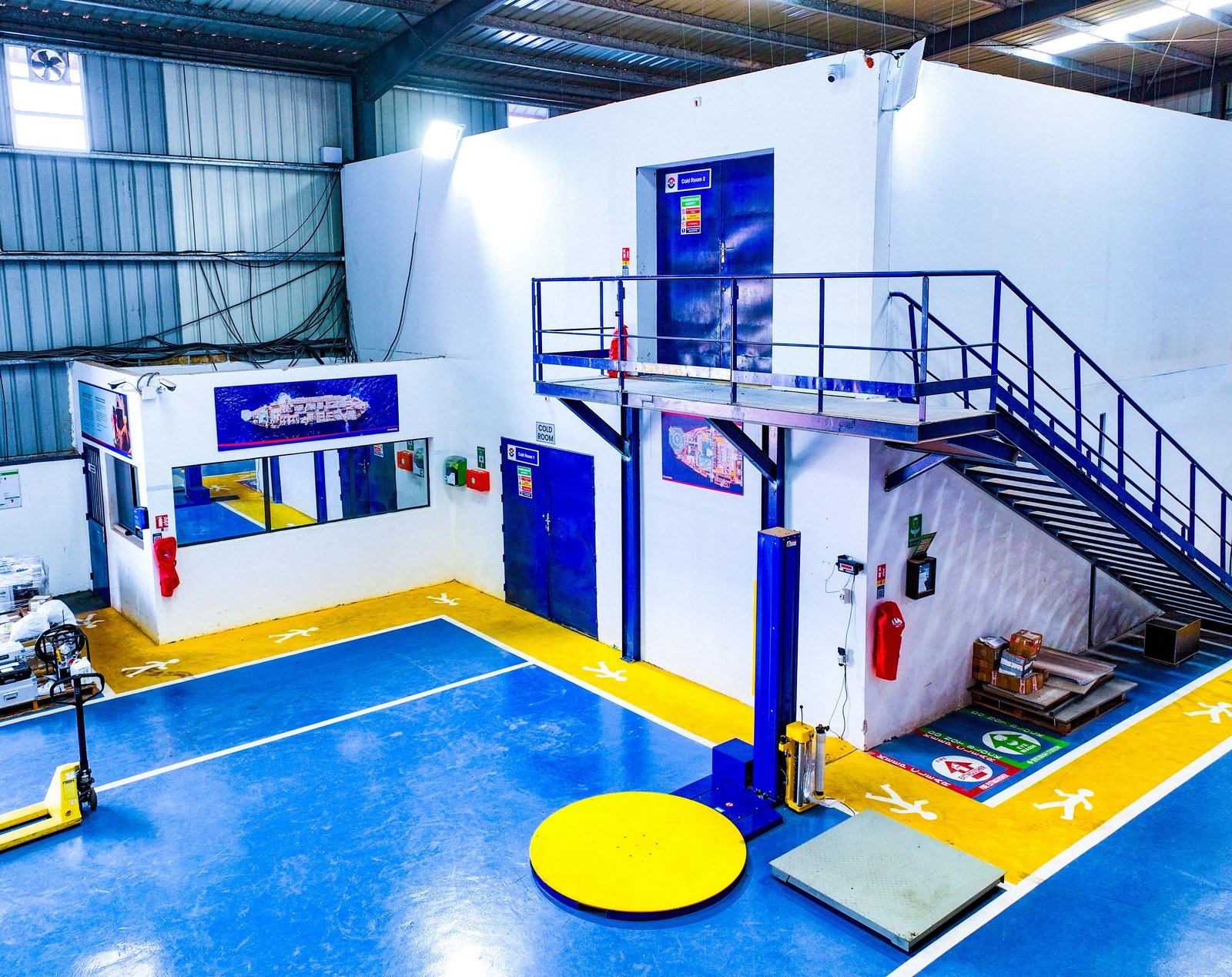 Interior of the SILS warehouse with temperature-controlled cold rooms and marked floor circulation